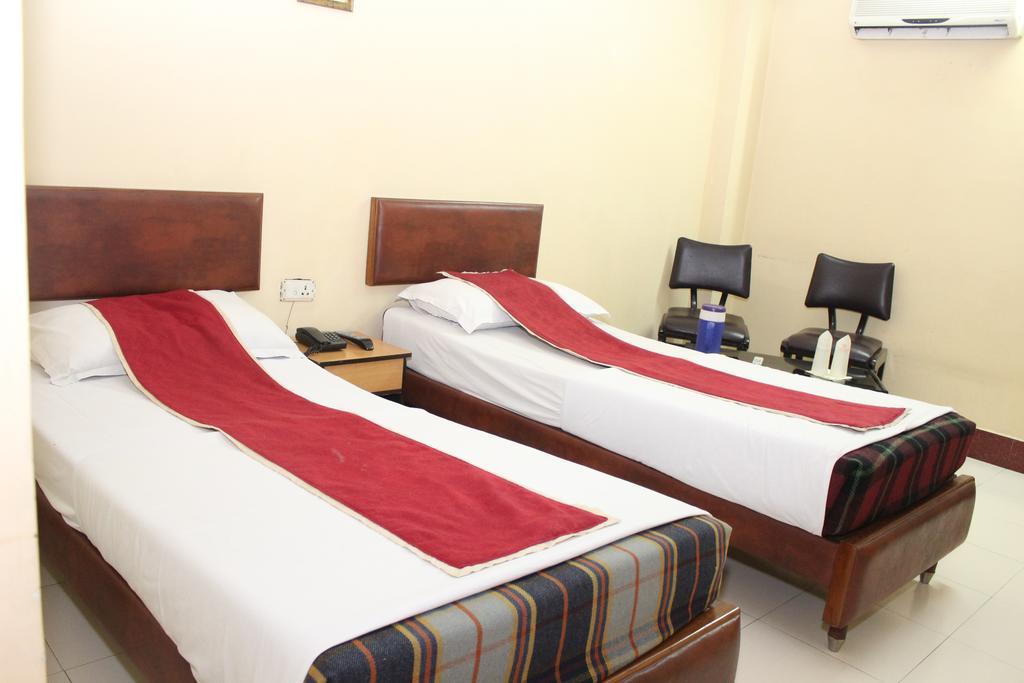 Hotel Bengal International Shiliguri Zimmer foto